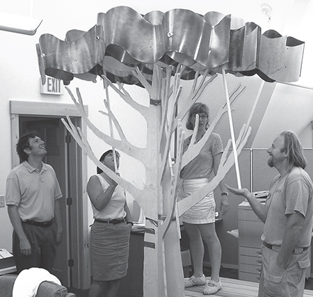 Members of the Environmental Exhibit Collaborative (EEC) working with prototypes during a development meeting for the traveling exhibition Tree Houses. Photo by Don Biehl, courtesy of Ecotarium, Worcester, MA.